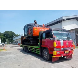 Selfloader Delivery of Heavy Equipment Surabaya - Jakarta Cheap Price
